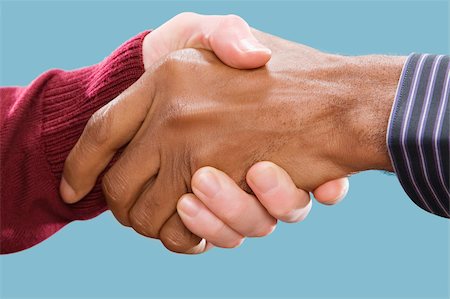 pic of global handshake - Close-up of two businessmen's shaking hands Stock Photo - Premium Royalty-Free, Code: 625-02931606