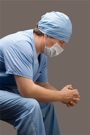 simsearch:625-02929180,k - Side profile of a male surgeon thinking Stock Photo - Premium Royalty-Free, Code: 625-02931749