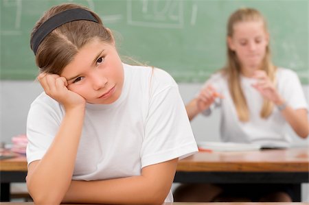 simsearch:614-06895765,k - Close-up of a schoolgirl thinking in a classroom Stock Photo - Premium Royalty-Free, Code: 625-02932416