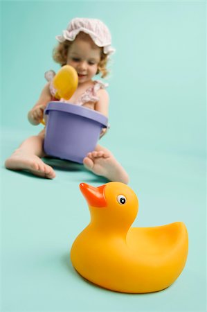 simsearch:625-02929316,k - Girl playing with toys and smiling Stock Photo - Premium Royalty-Free, Code: 625-02932529