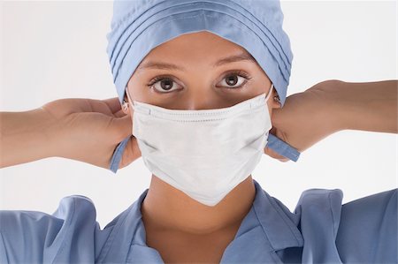 simsearch:625-02929180,k - Portrait of a female surgeon holding a syringe Stock Photo - Premium Royalty-Free, Code: 625-02932584