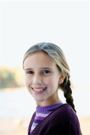 pictures of braids for a 12 year old girl - Portrait of a girl smiling Stock Photo - Premium Royalty-Free, Code: 625-02932910