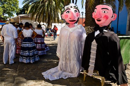Puppets and dancers at a wedding ceremony, Oaxaca, Oaxaca State, Mexico Stock Photo - Premium Royalty-Free, Code: 625-02933367
