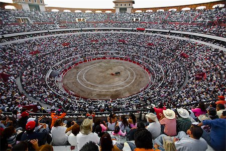 sports events - Spectators watching a bullfight in a bullring, Plaza De Toros San Marcos, Aguascalientes, Mexico Stock Photo - Premium Royalty-Free, Code: 625-02933755