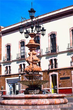 simsearch:625-01751647,k - Low angle view of a fountain in front of a building, Fuente De Los Faroles, Zacatecas, Mexico Stock Photo - Premium Royalty-Free, Code: 625-02933789