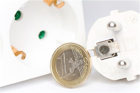 simsearch:628-02953757,k - Plug, socket and one euro coin, Germany Stock Photo - Premium Royalty-Free, Code: 628-05817353