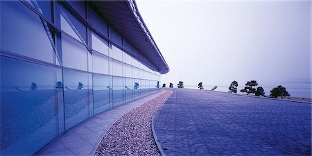 street and colored buildings - Building with glass front at waterside Stock Photo - Premium Royalty-Free, Code: 628-05817403