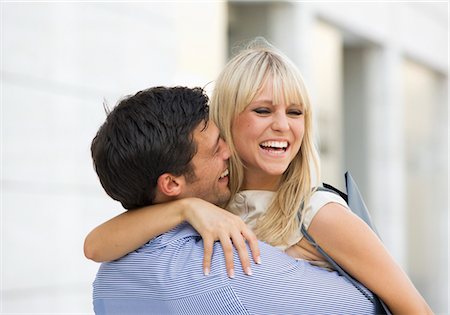 simsearch:628-07072151,k - Happy couple hugging outdoors Stock Photo - Premium Royalty-Free, Code: 628-05817523