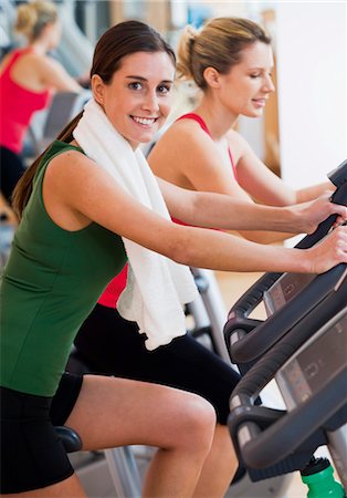 simsearch:628-05817723,k - Two women exercising at a health club Stock Photo - Premium Royalty-Free, Code: 628-05817572