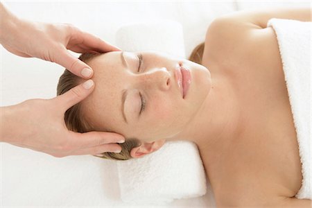 Woman receiving head massage Stock Photo - Premium Royalty-Free, Code: 628-05817586