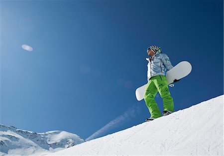sports and snowboarding - Man standing with snowboard at halfpipe Foto de stock - Sin royalties Premium, Código: 628-05817608