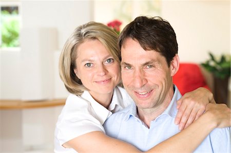 simsearch:628-07072151,k - Happy couple at home, Munich, Bavaria, Germany Stock Photo - Premium Royalty-Free, Code: 628-05818123