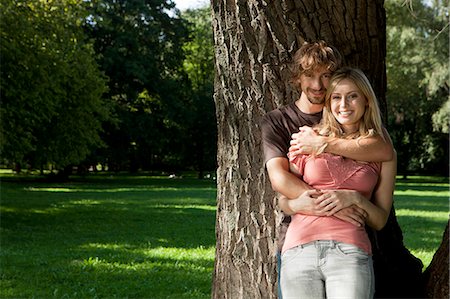 simsearch:628-07072151,k - Happy young couple embracing outdoors Stock Photo - Premium Royalty-Free, Code: 628-07072305