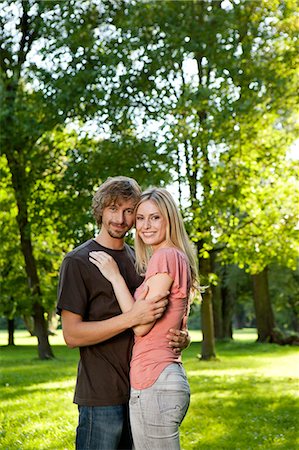 simsearch:628-07072151,k - Happy young couple embracing outdoors Stock Photo - Premium Royalty-Free, Code: 628-07072310