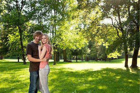simsearch:628-07072151,k - Happy young couple embracing outdoors Stock Photo - Premium Royalty-Free, Code: 628-07072311