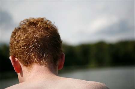 Redheaded man at a lake Stock Photo - Premium Royalty-Free, Code: 628-07072497