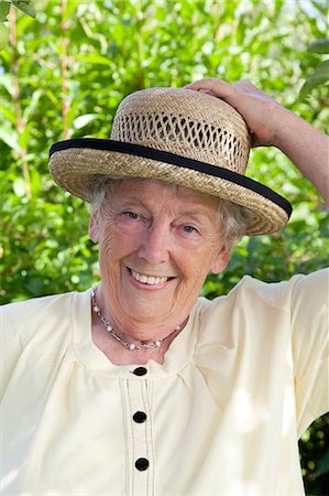 simsearch:628-07072621,k - Smiling old woman wearing straw hat Stock Photo - Premium Royalty-Free, Code: 628-07072576