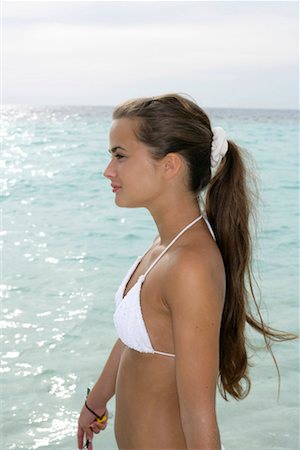simsearch:628-00919176,k - Young girl wearing bikini, standing at the beach Stock Photo - Premium Royalty-Free, Code: 628-00919176