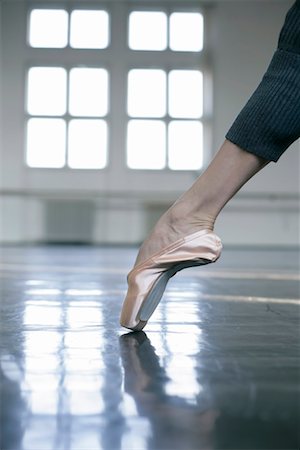 simsearch:628-00919304,k - A female ballet dancer wearing a ballet shoe Stock Photo - Premium Royalty-Free, Code: 628-00919304