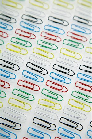 Paper clips in a row Stock Photo - Premium Royalty-Free, Code: 628-01494985