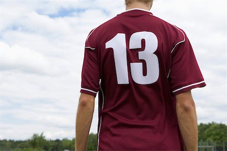 sports jersey - Kicker with number 13 Stock Photo - Premium Royalty-Free, Code: 628-01586536