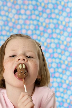 freckled girl - Girl having a Lolly Stock Photo - Premium Royalty-Free, Code: 628-01711948