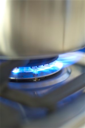 Pot on gas stove Stock Photo - Premium Royalty-Free, Code: 628-02953519