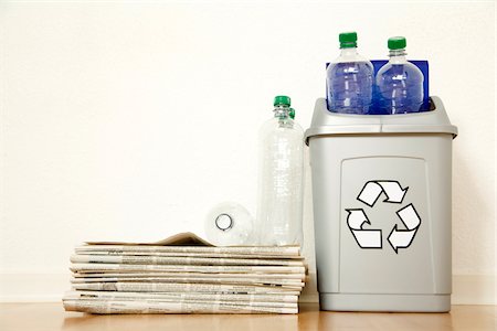 environment icon - Newspapers and plastic bottles in recycling bin, Germany Stock Photo - Premium Royalty-Free, Code: 628-02953705