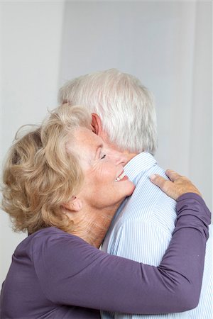 Happy senior couple hugging Stock Photo - Premium Royalty-Free, Code: 628-03201149