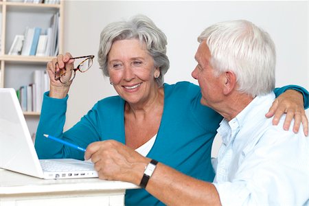 senior humour - Happy senior couple using laptop Stock Photo - Premium Royalty-Free, Code: 628-03201169