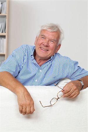 sentiment - Confident senior man sitting on couch Stock Photo - Premium Royalty-Free, Code: 628-03201180