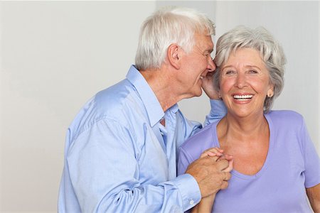 elderly lady talking to people - Senior couple whispering Stock Photo - Premium Royalty-Free, Code: 628-03201198