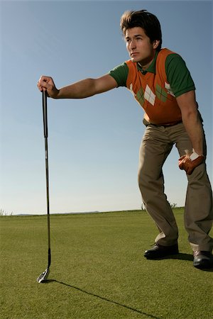 Young man on golf course Stock Photo - Premium Royalty-Free, Code: 628-03201227