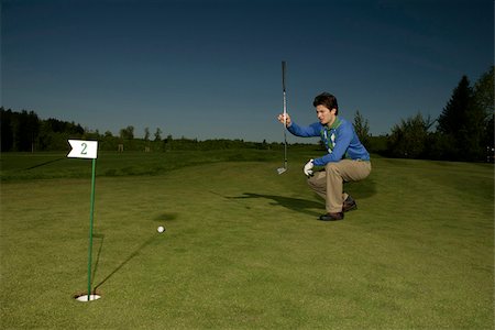 Jeune homme sur le terrain de golf Photographie de stock - Premium Libres de Droits, Code: 628-03201251