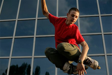 Inline skater jumping Stock Photo - Premium Royalty-Free, Code: 628-03201393