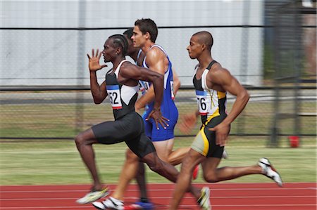 professional sports - Athletes Competing In Race Stock Photo - Premium Royalty-Free, Code: 622-05602895