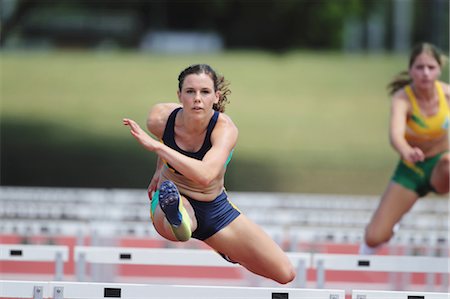 professional sports - Runners Clearing Hurdles Stock Photo - Premium Royalty-Free, Code: 622-05602902