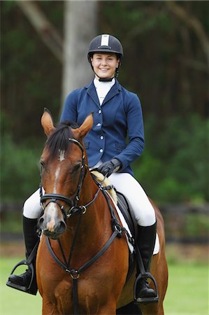 simsearch:622-05786738,k - Portrait of Young Horseback Rider, Smiling Stock Photo - Premium Royalty-Free, Code: 622-05786741