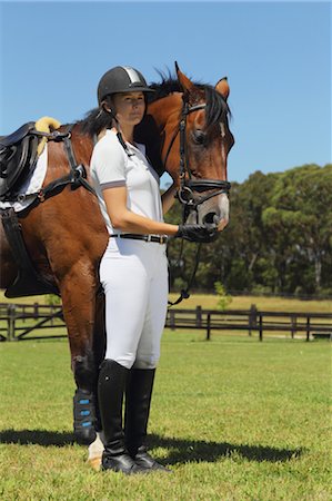 simsearch:622-05786787,k - Young Woman Horseback Rider with Brown Horse Stock Photo - Premium Royalty-Free, Code: 622-05786750