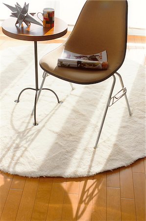 empty modern interior - Chair And Table On Rug Stock Photo - Premium Royalty-Free, Code: 622-06009662