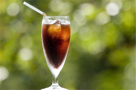 softdrink - Glass Of Cold Drink With Straw Stock Photo - Premium Royalty-Free, Code: 622-06009951