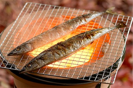 simsearch:614-03763965,k - Close Up Of Fishes On Grill Stock Photo - Premium Royalty-Free, Code: 622-06009980