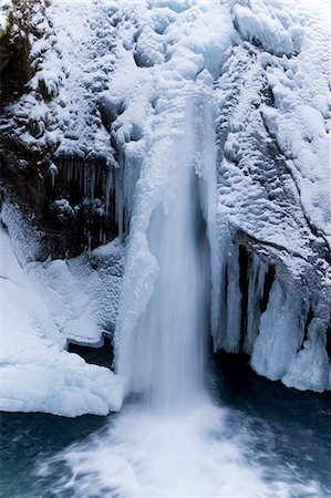 pretty tourist attraction backgrounds - Frozen Waterfall In Winter Stock Photo - Premium Royalty-Free, Code: 622-06010032