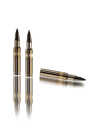 Close Up Of Three Bullets Stock Photo - Premium Royalty-Free, Code: 622-06190919