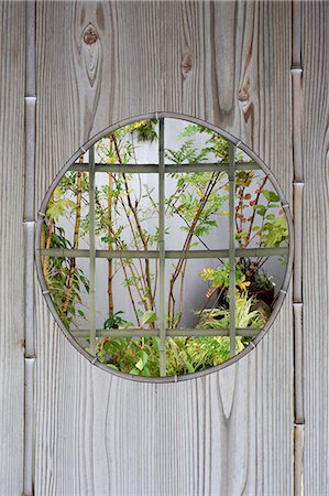 fabric designs patterns - Round Window With Green Plants Stock Photo - Premium Royalty-Free, Code: 622-06191119