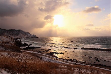 simsearch:614-06814364,k - Sunset View Of Coast Whilst Waves Touching Sand Stock Photo - Premium Royalty-Free, Code: 622-06191447