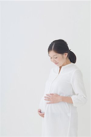 Pregnant woman Stock Photo - Premium Royalty-Free, Code: 622-06369633