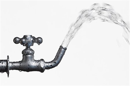 saving - Water flowing from faucet Stock Photo - Premium Royalty-Free, Code: 622-06369918