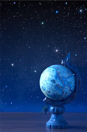 Globe and stars in the night sky Foto de stock - Sin royalties Premium, Código: 622-06398382