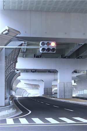 expressway in japan - Street under the highway with traffic light and zebra crossing Stock Photo - Premium Royalty-Free, Code: 622-06439277